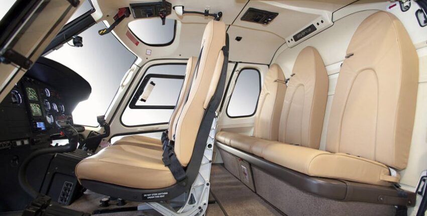 location hélicoptère - intérieur H125 avec sièges en cuir beige